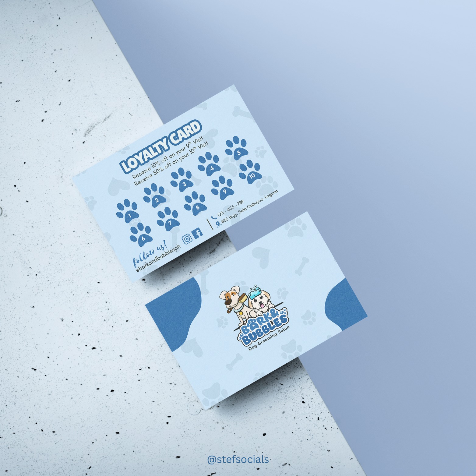 A blue loyalty card design for Bark & Bubbles Dog Grooming Salon, featuring playful dog illustrations, paw-print stamp spaces, and discounts for repeat visits. The mockup displays both the front and back against a light blue and textured white background.