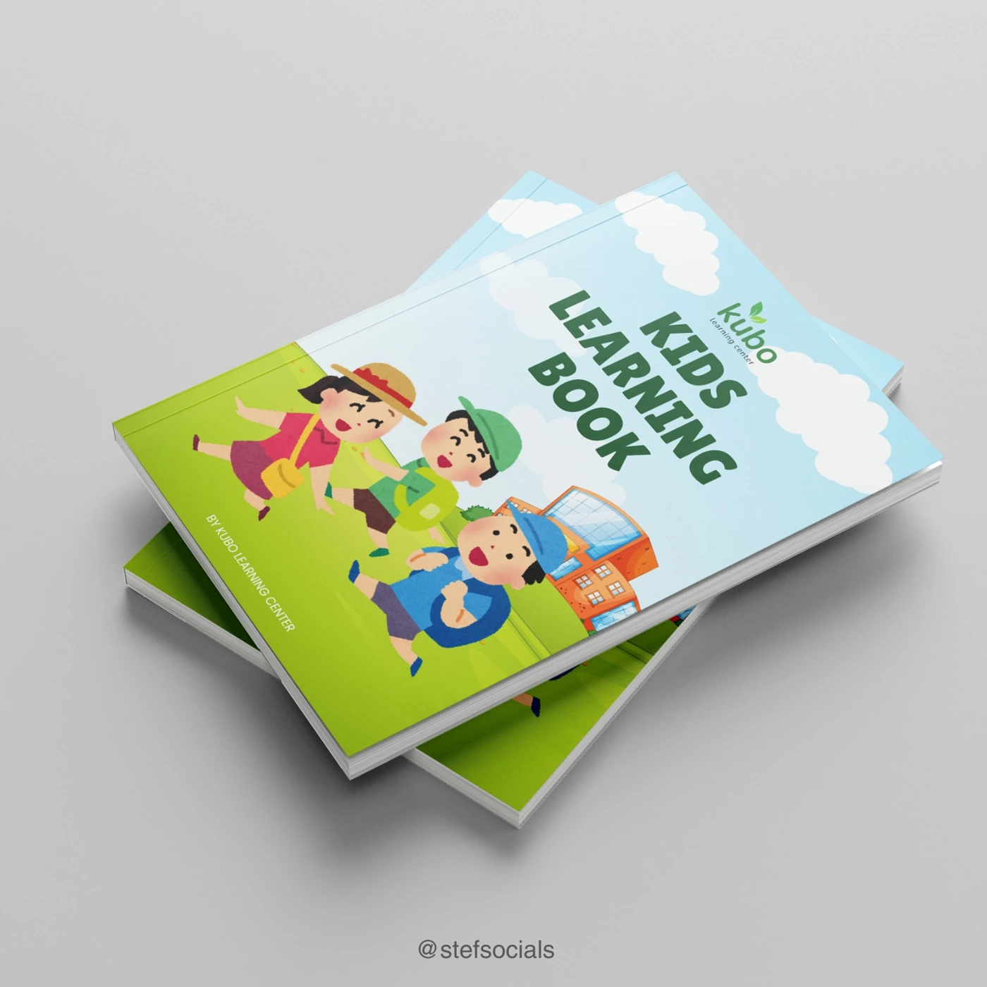Children's learning book cover mockup with illustrated children and a colorful landscape
